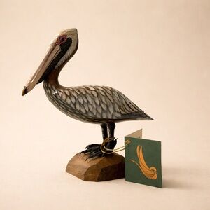 NWT John J. Madison Co wooden hand carved hand painted pelican figurine